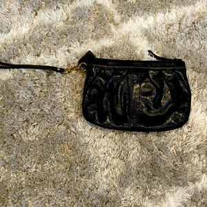 Leather Coach wristlet.